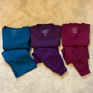 Cherokee Women's Scrub Tops in Teal, Purple, and Burgundy